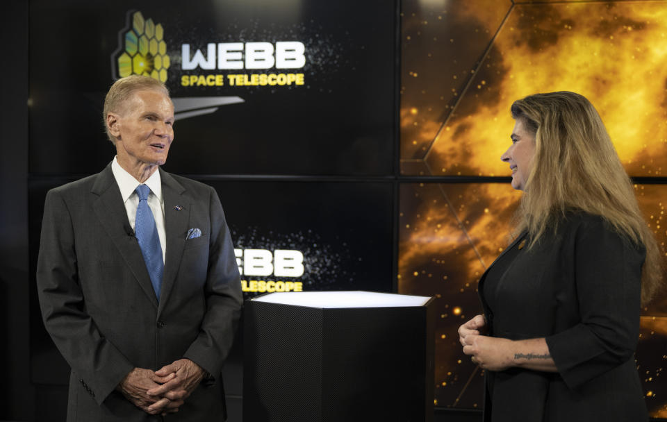 In this image released by NASA, NASA administrator Bill Nelson, left, speaks with assistant director of science at NASA's Goddard Space Flight Center Michelle Thaller, right, during a broadcast releasing the first full-color images from NASA's James Webb Space Telescope, Tuesday, July 12, 2022, at NASA's Goddard Space Flight Center in Greenbelt, Md. (Bill Ingalls/NASA via AP)