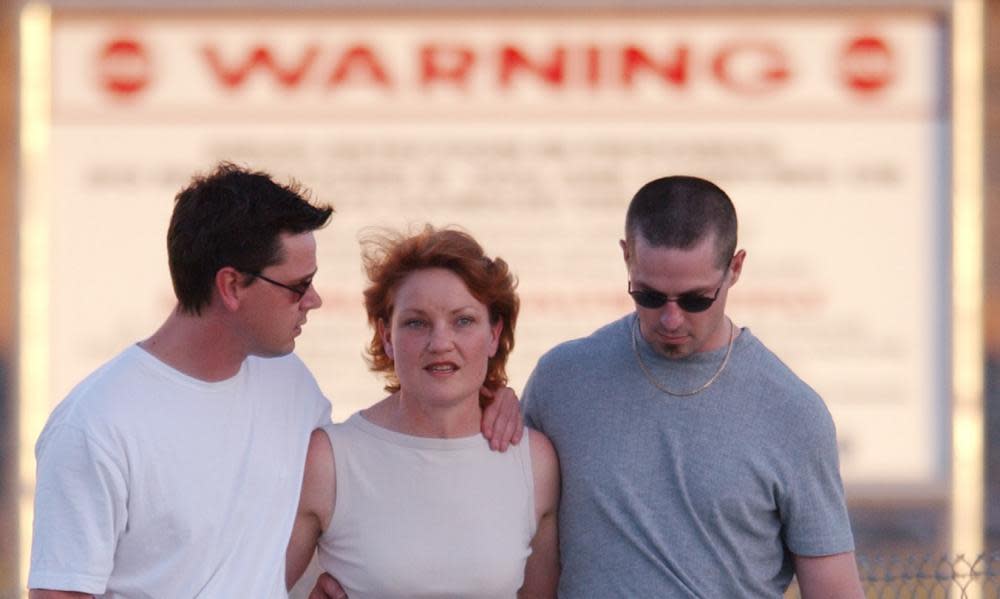 Pauline Hanson with her sons as she was released from prison in 2003 after overturning a fraud conviction. Her One Nation co-founder was jailed at the same time and is looking for recompense for legal fees.