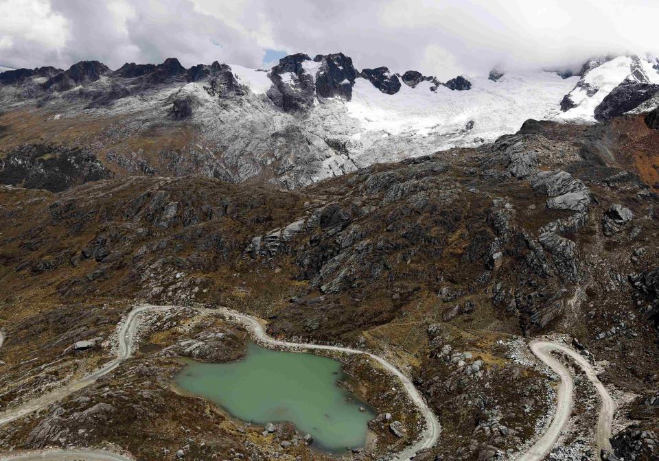 A view of a lake filled with glacial melt water is seen near Chopicalqui montain in Huascaran National Park in Huaraz