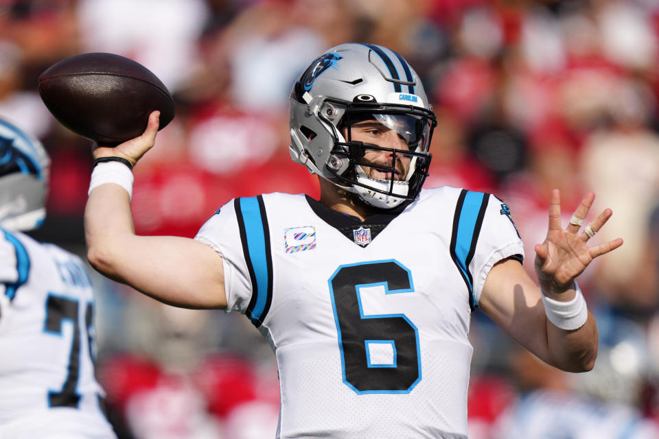 Carolina Panthers quarterback Baker Mayfield passes against the San Francisco 49ers during the first half an NFL football game on Sunday, Oct. 9, 2022, in Charlotte, N.C. (AP Photo/Jacob Kupferman)