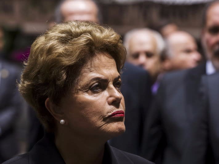 Brazil's President Dilma Rousseff looks on as she speaks to members of the media after speaking at an investment summit regarding Brazil's infrastructure on a visit to New York, June 29, 2015. REUTERS/Lucas Jackson 