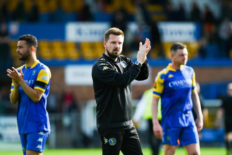 Adam Lakeland applauds the home fans after King's Lynn Town's final home game of the season <i>(Image: Ian Burt)</i>