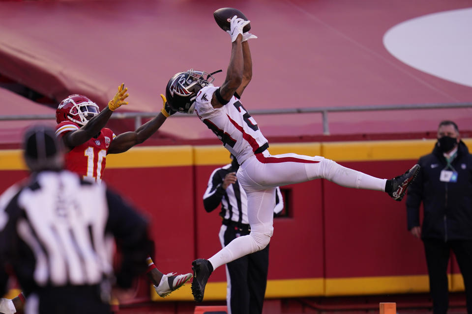 Atlanta Falcons cornerback A.J. Terrell breaks up an incomplete pass intended for Kansas City Chiefs wide receiver Tyreek Hill during the second half of an NFL football game, Sunday, Dec. 27, 2020, in Kansas City. (AP Photo/Jeff Roberson)