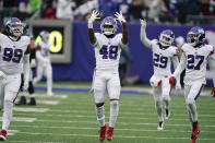 New York Giants' Tae Crowder (48) celebrates his interception during the first half of an NFL football game against the Philadelphia Eagles, Sunday, Nov. 28, 2021, in East Rutherford, N.J. (AP Photo/Corey Sipkin)