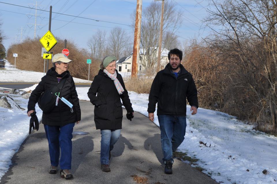 Bonnie LaFleur (left) and Donna Olenhouse (center) join Tristian Sutton-Jennings of the Hilliard Recreation and Parks Department for the weekly Hilliard Hikes event Jan. 19 on the Heritage Rail Trail.