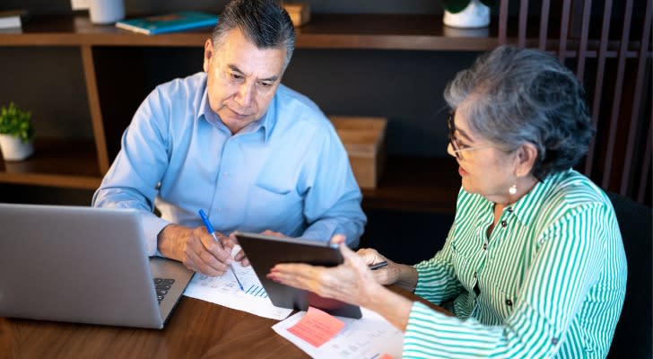 A couple looking at the return on their annuity