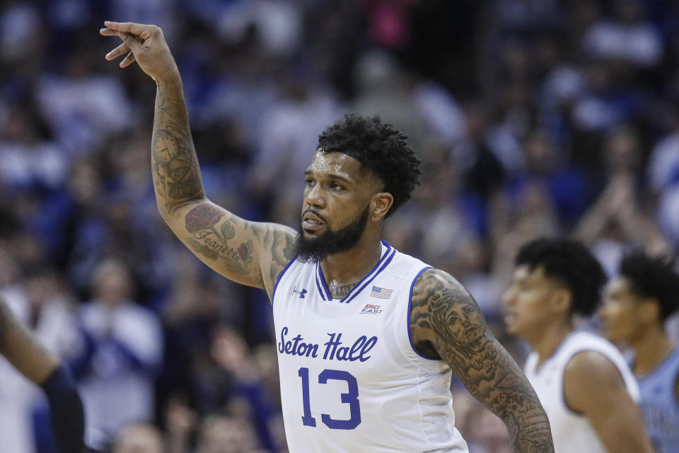 Seton Hall's Myles Powell reacts after scoring during the first half of an NCAA college basketball game against Villanova, Wednesday, March 4, 2020, in Newark, N.J. (AP Photo/John Minchillo)