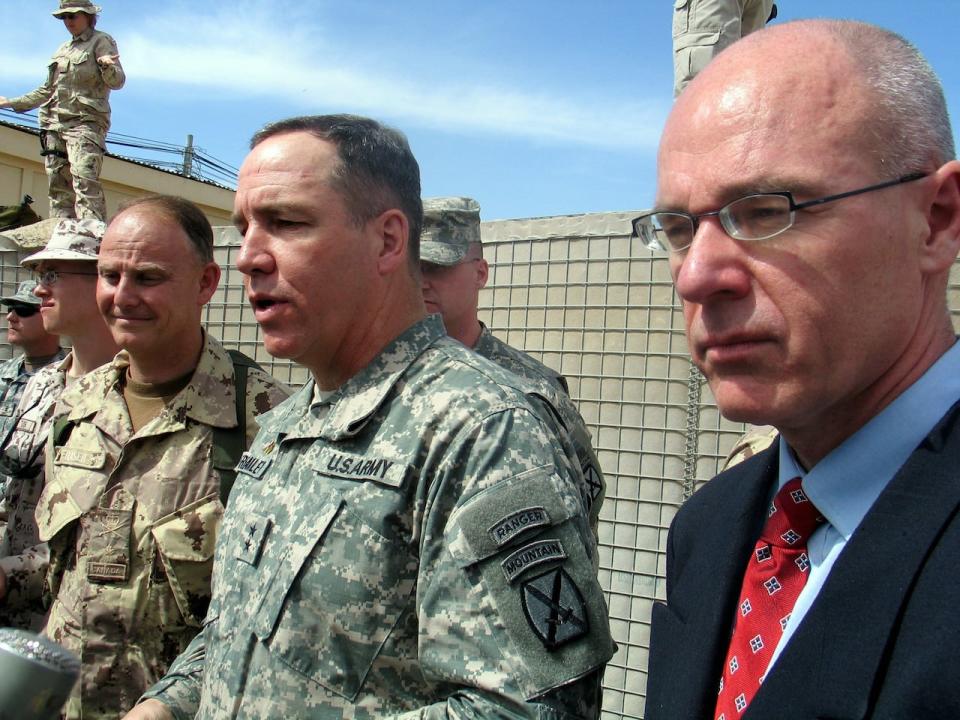 From left, Brig.-Gen. David Fraser, U.S. Maj.-Gen. Benjamin Freakley and David Sproule, then the Canadian ambassador to Afghanistan, speak with reporters after the change of command ceremony on Feb. 28, 2006, that put Fraser in charge of coalition troops on the ground in southern Afghanistan. Sproule is currently Ottawa's Special Representative to Afghanistan, though he is based in Doha, Qatar. 