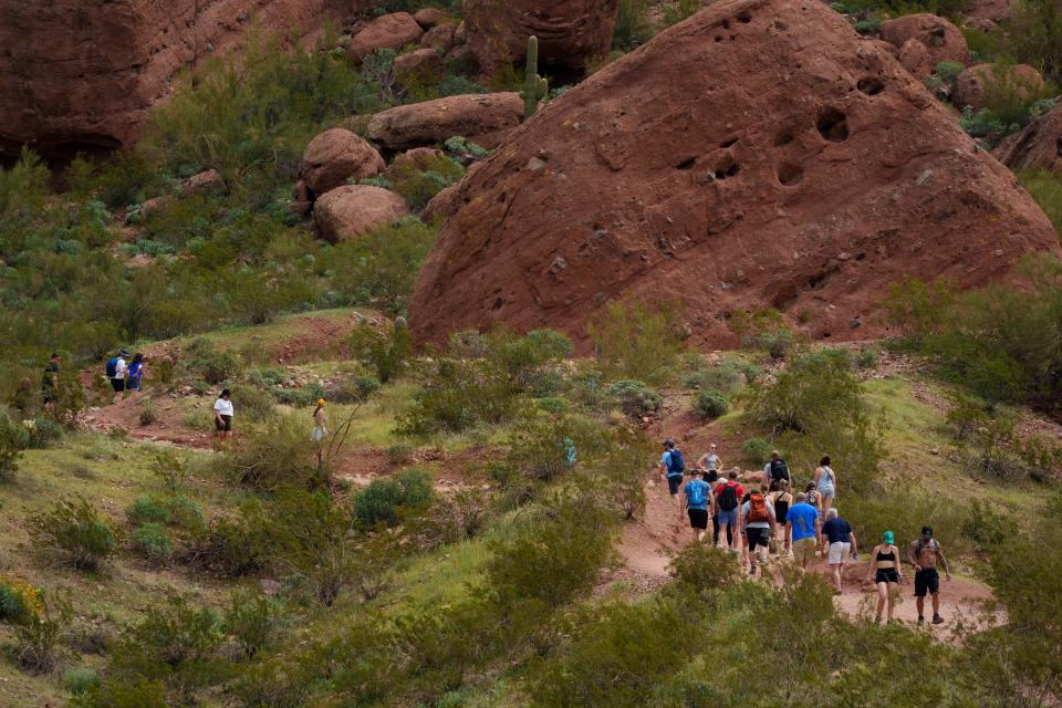 Hikers crowd Echo Canyon Trail at Camelback Mountain on March 11, 2023, in Phoenix.