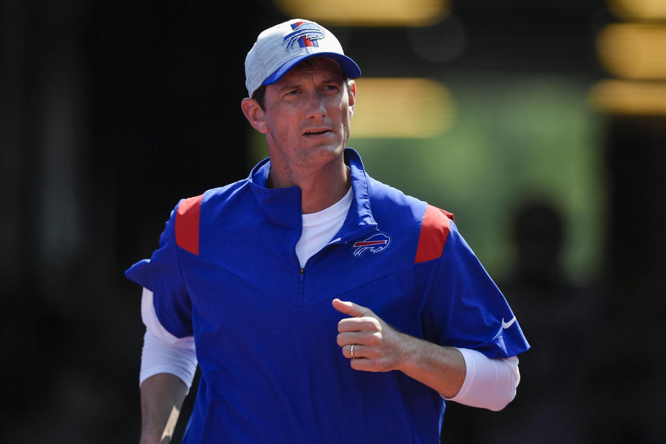 Buffalo Bills quarterbacks coach Ken Dorsey runs on the field before a preseason NFL football game against the Green Bay Packers in Orchard Park, NY, Saturday, Aug.  28, 2021. (AP Photo/Adrian Kraus)