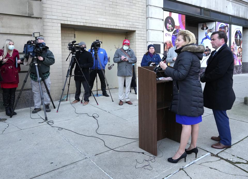 Ohio gubernatorial candidate John Cranley, far right, who is also the former mayor of Cincinnati, announced his running mate, State Senator Teresa Fedor of Toledo, second from right, during a windy press conference across the street from the Ohio Statehouse on Wednesday, January 5, 2021.