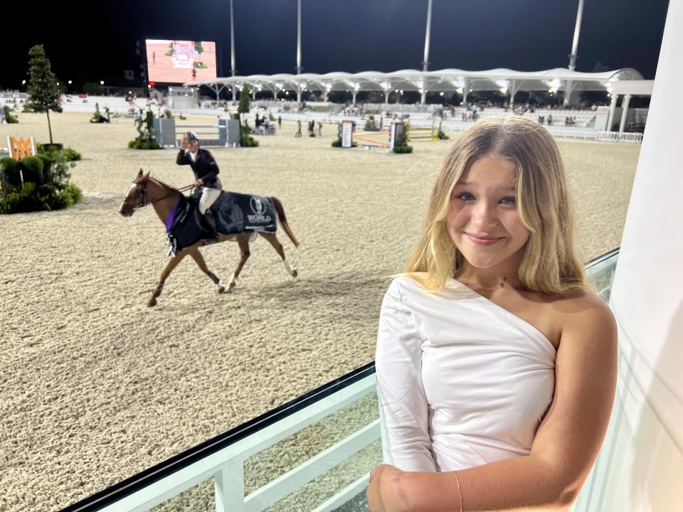 My daughter with the night's winning rider. (Photo: Terri Peters)