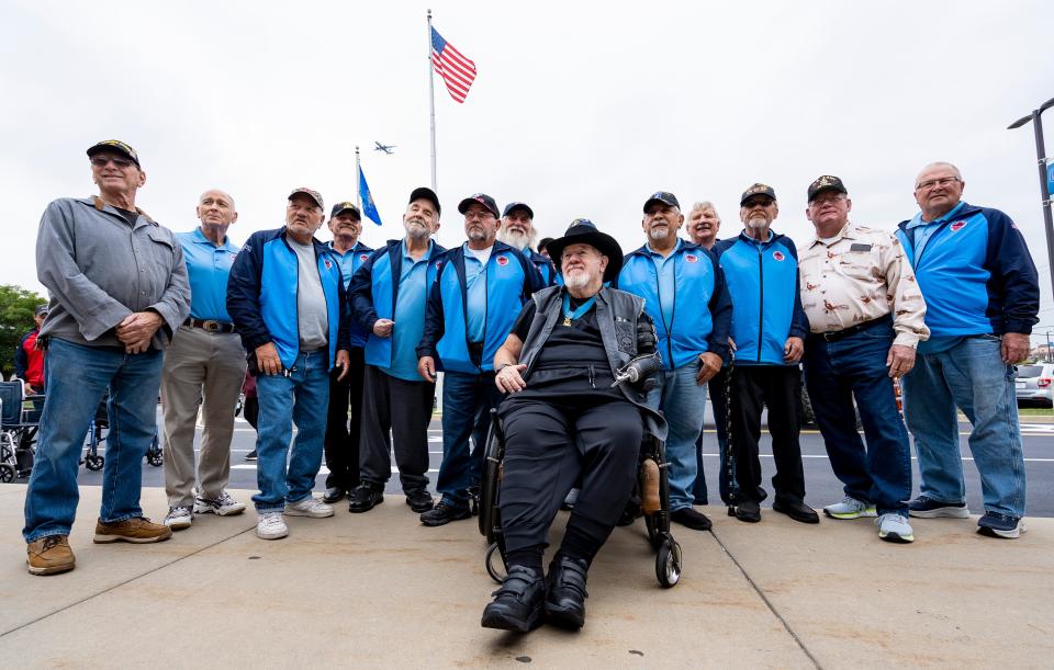 Fifteen Vietnam veterans, all graduates of Oak Creek High School between 1967-73, arrive at the school for a celebration and parade on the morning before their Stars and Stripes Honor Flight.