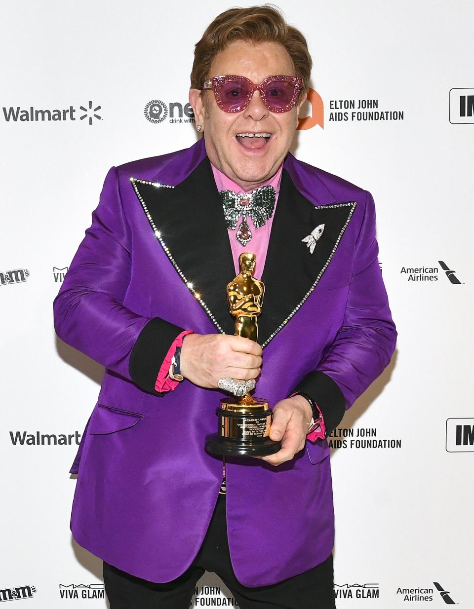 Elton John, who walked away with the award for Best Original Song, attends his 28th Annual AIDS Foundation Academy Awards Viewing Party. 