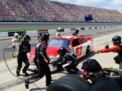 BROOKLYN, MI - JUNE 17: Kurt Busch, driver of the #51 Phoenix Construction Services Chevrolet, pits after an incident early in the NASCAR Sprint Cup Series Quicken Loans 400 at Michigan International Speedway on June 17, 2012 in Brooklyn, Michigan. (Photo by John Harrelson/Getty Images for NASCAR)