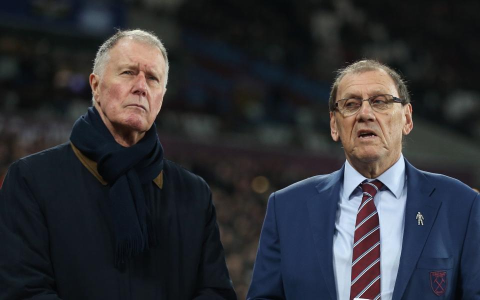 Sir Geoff Hurst and Brian Dear during a tribute to the late Martin Peters at London Stadium on December 28, 2019 - Brian Dear interview: ‘We were mainly from Barking, Dagenham, East Ham’ – West Ham’s European win - CameraSport/Rob Newell