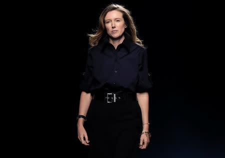 Designer Clare Waight Keller enters a catwalk at the end of her Spring/Summer 2019 women's ready-to-wear collection show for fashion house Givenchy during Paris Fashion Week in Paris, France, September 30, 2018. REUTERS/Gonzalo Fuentes