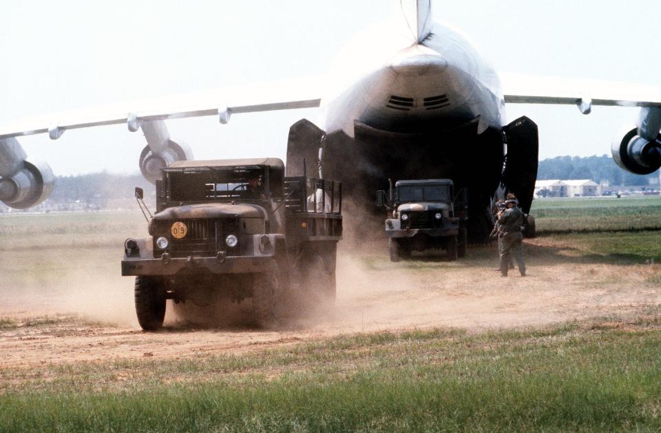 C-5A Galaxy unloads trucks