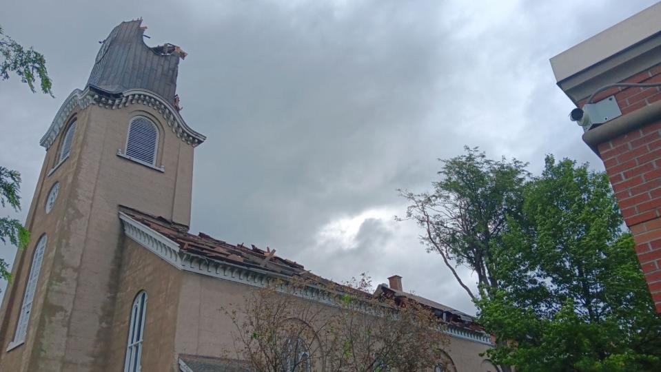 The steeple and parts of the roof of the First Presbyterian Church in Rome are gone following Tuesday's storms.