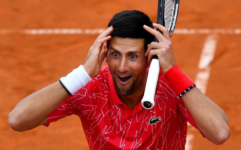 Novak Djokovic during a charity exhibition in Belgrade on June 12 - AFP