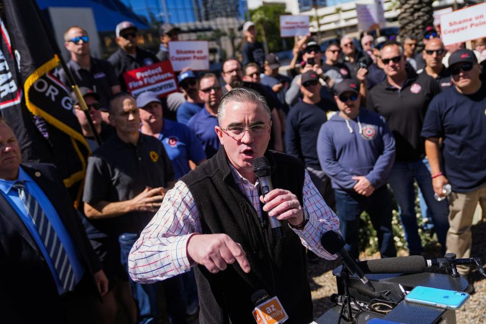 IAFF General President Edward Kelly gives a speech supporting Goodyear firefighter Gilbert Aguirre outside the CopperPoint Insurance Companies building on April 5, 2023, in Phoenix. Aguirre was diagnosed with chronic myeloid leukemia, a work-related cancer, in 2015. The insurance company has repeatedly declined Aguirre's workers' compensation claim, arguing he failed to prove he got cancer on the job.