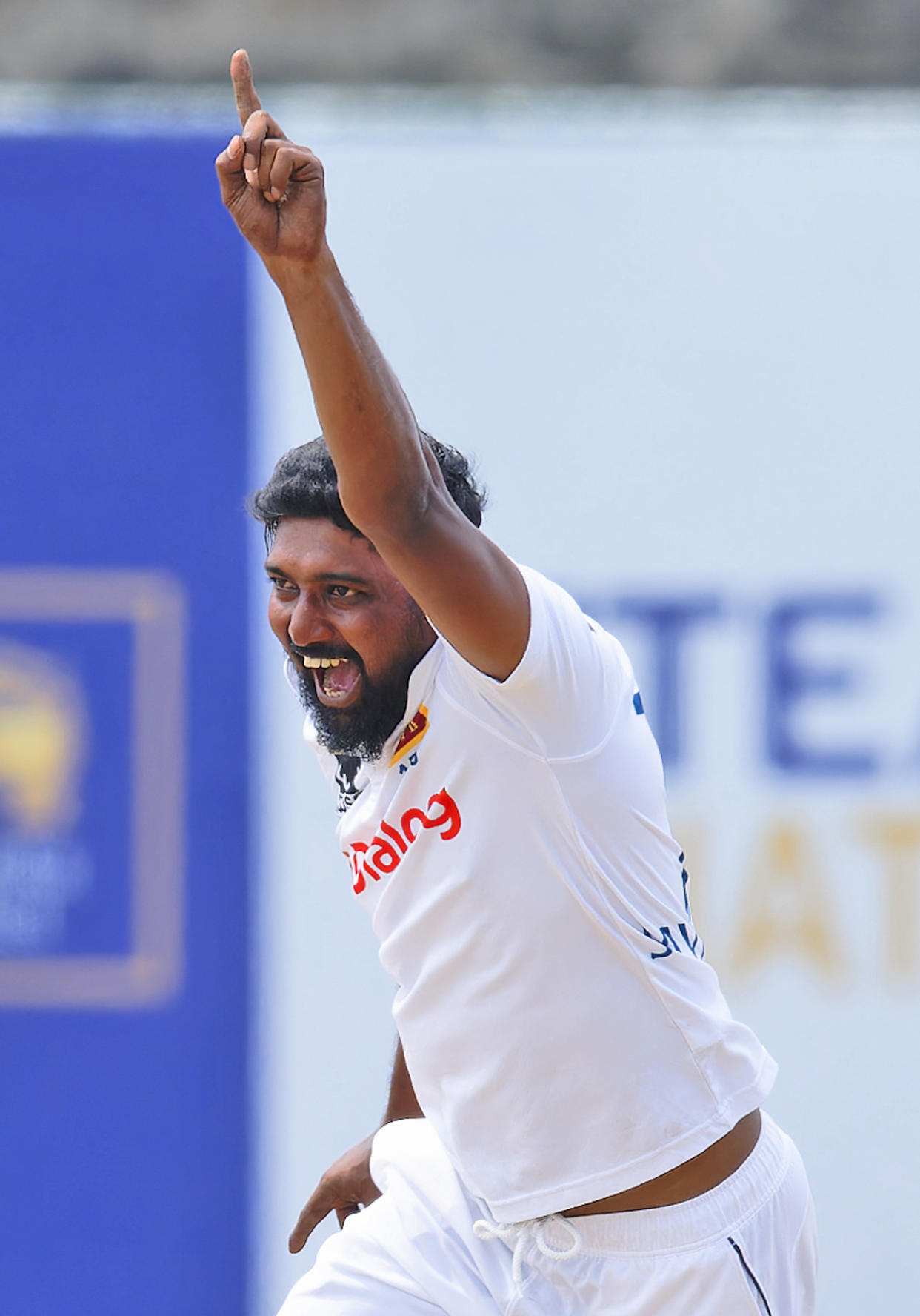 Sri Lanka's Prabath Jayasuriya celebrates the wicket of New Zealand's Rachin Ravindra on the fifth and final day of the first cricket test match between New Zealand and Sri Lanka in Galle, Sri Lanka, Monday, Sept. 23, 2024. (AP Photo/Viraj Kothalawala)