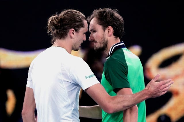 Daniil Medvedev, right, is congratulated by Alexander Zverev 