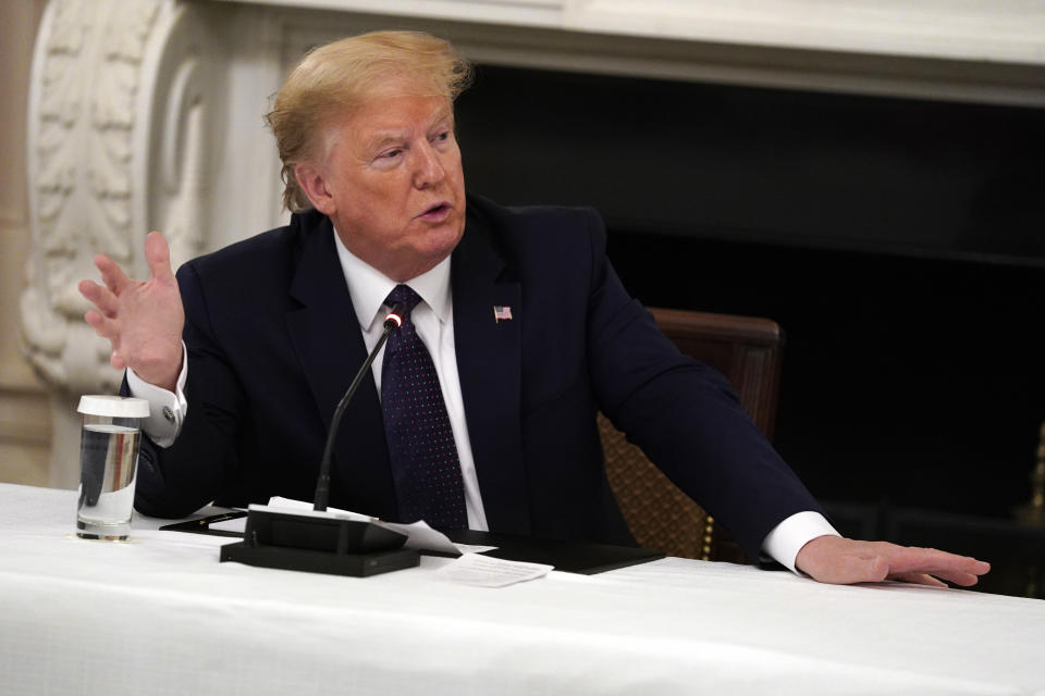 President Donald Trump speaks during a meeting with restaurant industry executives about the coronavirus response, in the State Dining Room of the White House, Monday, May 18, 2020, in Washington. (AP Photo/Evan Vucci)