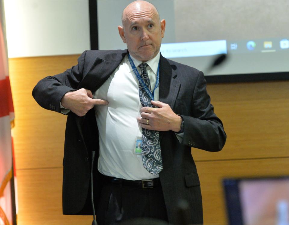 Chief medical examiner Russell Vega demonstrates the location of a fatal bullet wound he documented on Doug Benefield. Ashley Benefield is accused of killing her estranged husband, Doug Benefield, and is attempting to have the case dismissed under Florida's Stand Your Ground law. The hearing on the justifiable use of force immunity defense began Thursday, July 6, 2023 at the Manatee County Judicial Center in Bradenton, Florida and is expected to last two days.