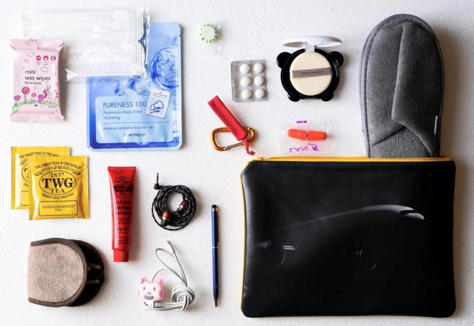 Cynthia packs this pouch with her inflight essentials, so she keeps her legroom clear (Cynthia Drescher)