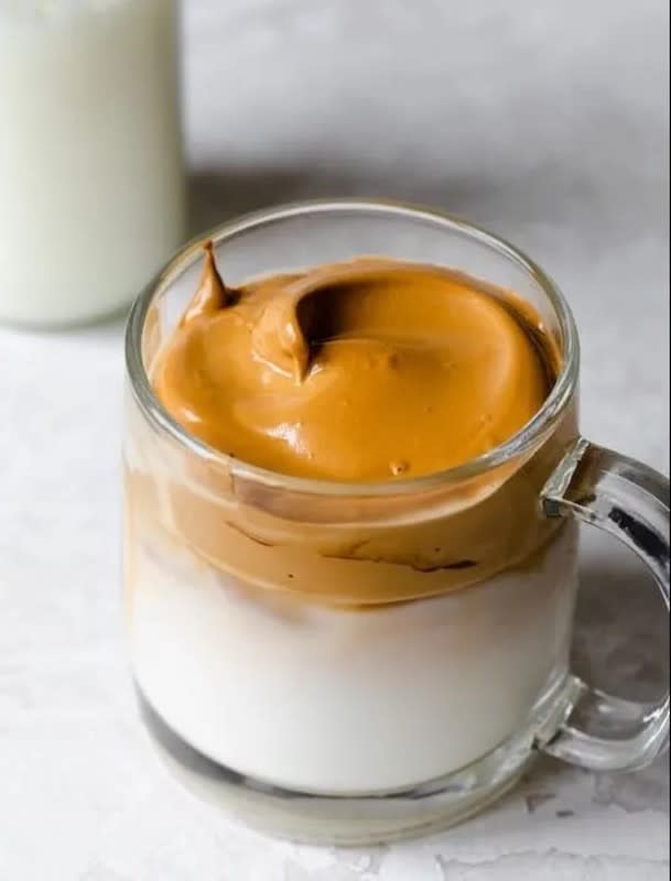 <p>Yumna Jawad</p><p>The tasty autumnal twist on the famous whipped coffee. </p><p><strong>Get the recipe: <a href="https://parade.com/1117405/allymeyerowitz/pumpkin-whipped-coffee-recipe/" rel="nofollow noopener" target="_blank" data-ylk="slk:Pumpkin Whipped Coffee;elm:context_link;itc:0;sec:content-canvas" class="link rapid-noclick-resp">Pumpkin Whipped Coffee</a></strong></p>