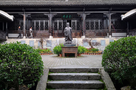 Men visit an attraction featuring Neo-Confucian philosopher Zhou Dunyi in Rucheng county, Hunan province, China December 3, 2018. Picture taken December 3, 2018. REUTERS/Shu Zhang