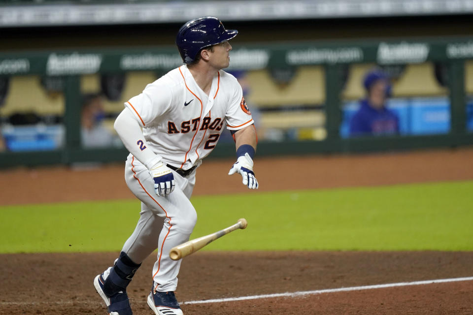 Houston Astros' Alex Bregman watches his two-run single against the Texas Rangers during the seventh inning of a baseball game Tuesday, Sept. 15, 2020, in Houston. (AP Photo/David J. Phillip)