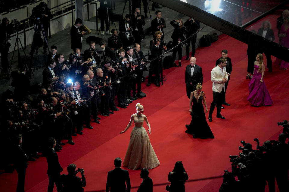 The cast pose for photographers upon departure from the premiere of the film 'Furiosa: A Mad Max Saga' at the 77th international film festival, Cannes, southern France, Wednesday, May 15, 2024. (Photo by Andreea Alexandru/Invision/AP)