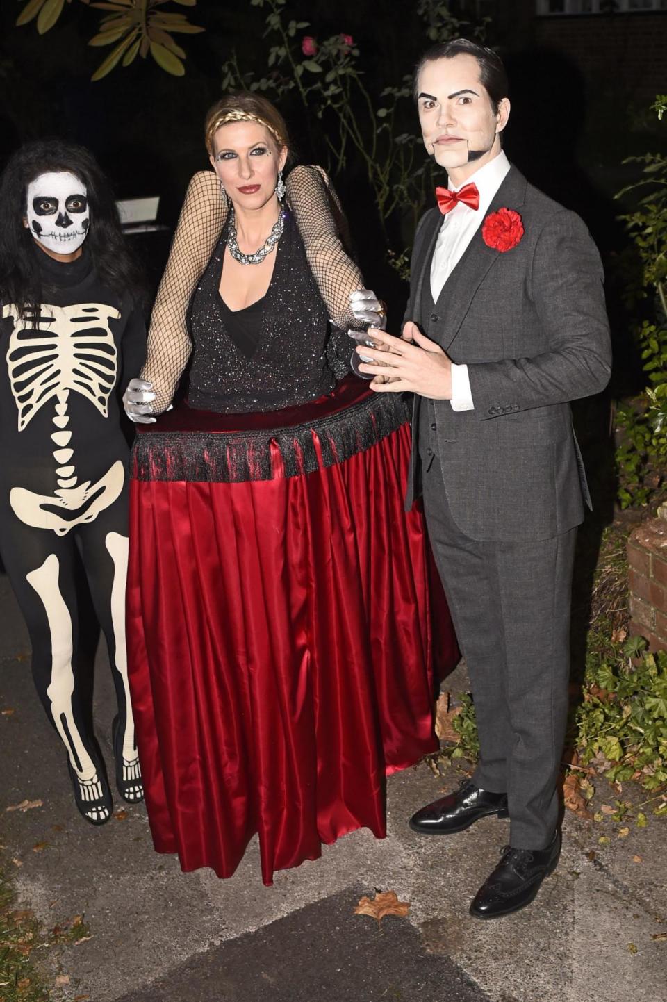 Jimmy Carr and Karoline Copping arrive at the Halloween party (PA)