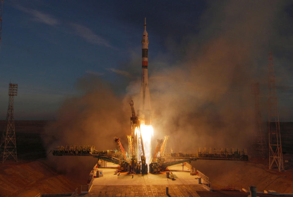 The Soyuz-FG rocket booster with Soyuz MS-11 space ship carrying a new crew to the International Space Station, ISS, blasts off at the Russian leased Baikonur cosmodrome, Kazakhstan, Monday, Dec. 3, 2018. The Russian rocket carries U.S. astronaut Anne McClain, Russian cosmonaut Оleg Kononenko‎ and CSA astronaut David Saint Jacques. (AP Photo/Dmitri Lovetsky)