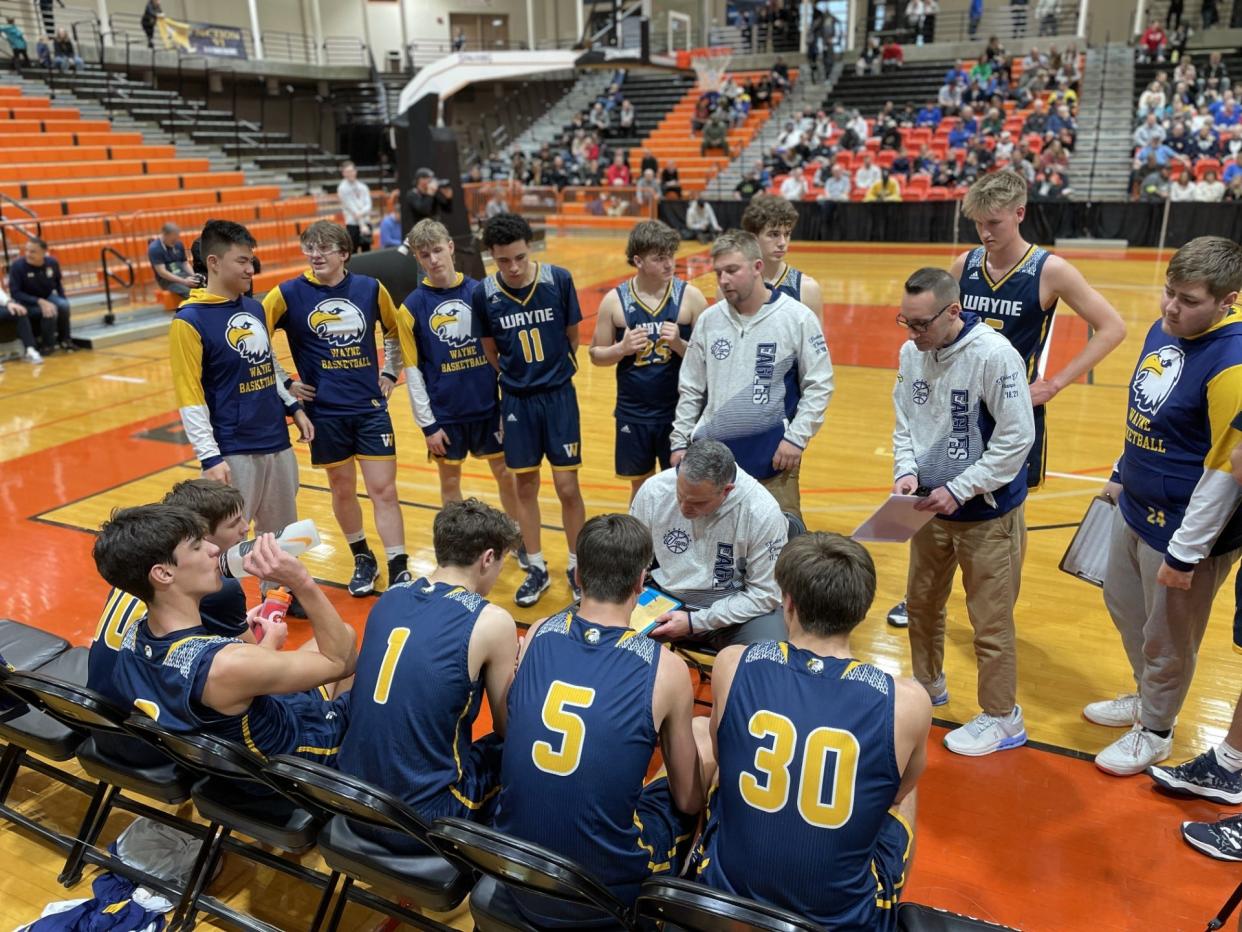 Wayne coach Bill Thomson talks to his Eagles during their 58-41 win over Section VI's Williamsville South in the NYSPHSAA Class A regionals Saturday, March 9, 2024 at Buffalo State.