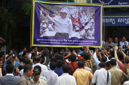 A banner of opposition leader and President of the Cambodia National Rescue Party (CNRP) Kem Sokha is seen during a news conference in Phnom Penh, Cambodia, September 25, 2017. REUTERS/Samrang Pring