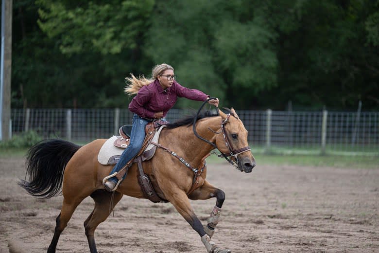 Chloe “Goldilocks” Mitchell, 15, trains with her horse. (Courtesy of Cherylen Flagg)