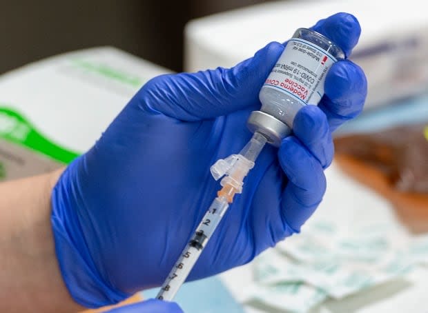 The territory says it has administered close to 20,000 doses of the Moderna vaccine across the territory. (Andrew Vaughan-Pool/The Canadian Press - image credit)