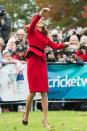 <p>No sneakers, no problem! Middleton throws a ball during a game of cricket in New Zealand.</p>