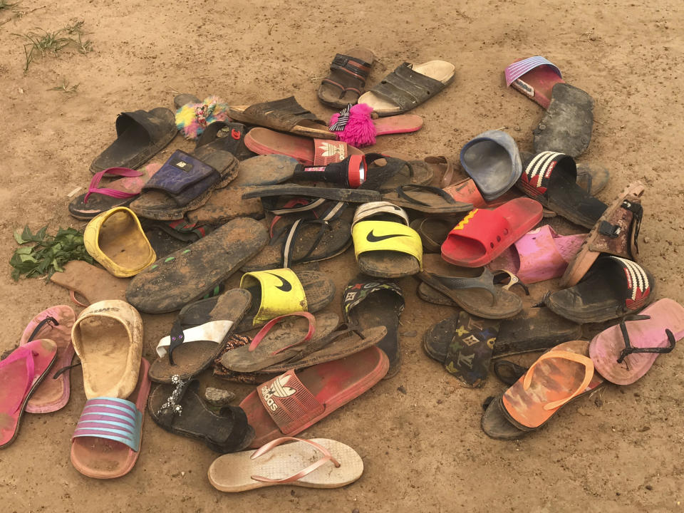 Flip flop sandals belonging to students of Bethel Baptist High School are seen following an attack by gunmen in Damishi Kaduna, Nigeria, Tuesday July 6, 2021. Dozens of students were abducted Monday by armed bandits at Bethel Baptist High School in Damishi town of Chikun Local Government Area in Kaduna State in northern Nigeria. Bandits stormed the school early Monday, around 2 a.m., shooting sporadically as they kidnapped the students, said police spokesman Mohammed Jalije. (AP Photo)