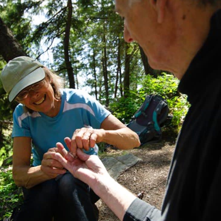 Debbie Gale patches a flapper on Ken's finger.