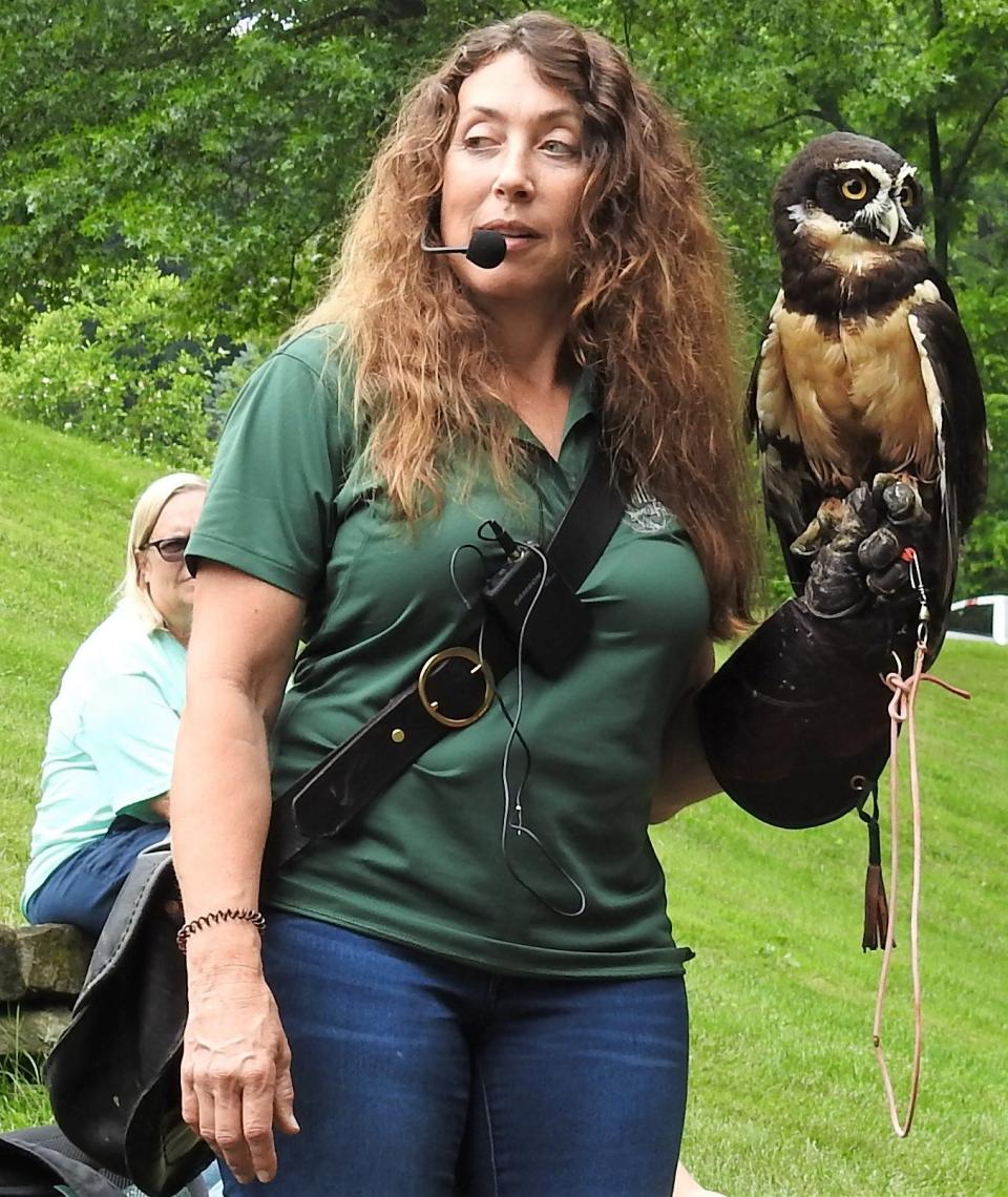 Becky Geiger of Midwest Falconry with a spectacled owl during a presentation recently at Clary Gardens.