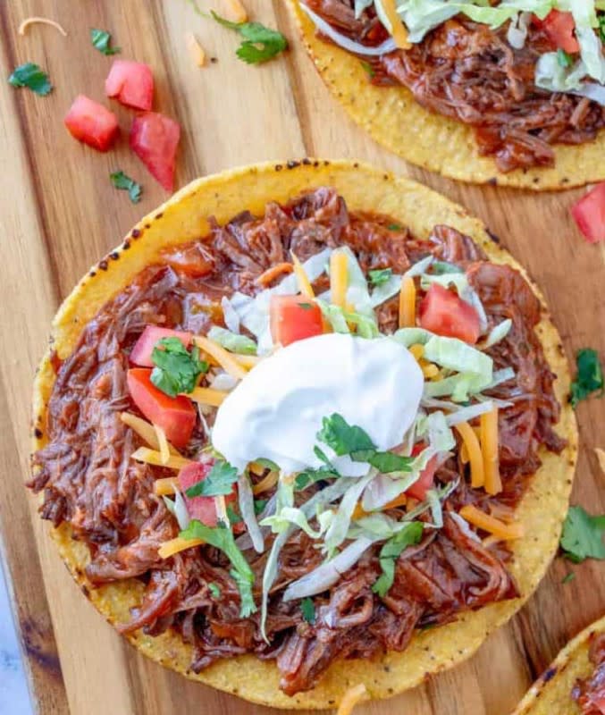 <p>The Country Cook</p><p>Start with a simple beef chuck roast, add some salsa and seasonings, and you've got the perfect taco filling.</p><p><strong>Get the recipe: <a href="https://www.thecountrycook.net/crock-pot-mexican-shredded-beef/" rel="nofollow noopener" target="_blank" data-ylk="slk:Crock Pot Mexican Shredded Beef;elm:context_link;itc:0;sec:content-canvas" class="link rapid-noclick-resp">Crock Pot Mexican Shredded Beef</a></strong></p>