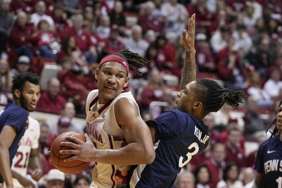 Indiana's Malik Reneau (5) goes to the basket against Penn State's Nick Kern Jr. (3) during the second half of an NCAA college basketball game, Saturday, Feb. 3, 2024, in Bloomington, Ind. (AP Photo/Darron Cummings)