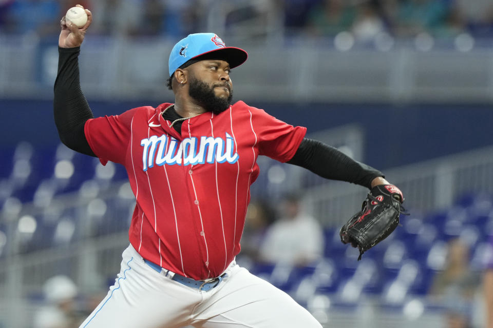 Miami Marlins starting pitcher Johnny Cueto aims a pitch during the first inning of a baseball game against the Colorado Rockies, Saturday, July 22, 2023, in Miami. (AP Photo/Marta Lavandier)