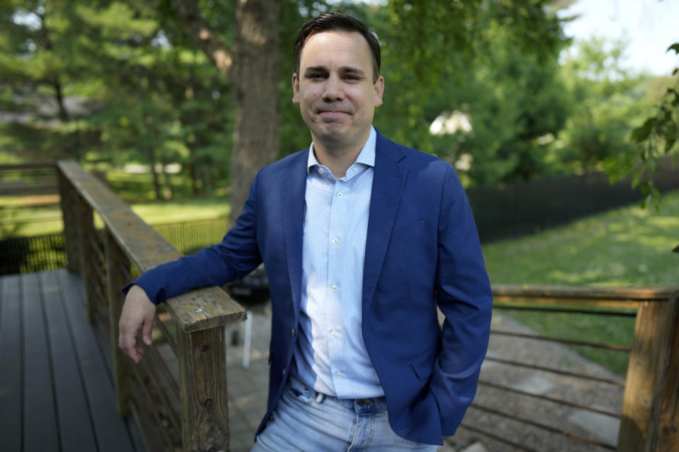 KCCI-TV chief meteorologist Chris Gloninger stands outside his home, Tuesday, June 27, 2023, in West Des Moines, Iowa. Gloninger has announced that he is leaving the Des Moines station due in part to threats he received for his coverage of climate change on air. (AP Photo/Charlie Neibergall)