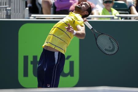 Mar 25, 2018; Key Biscayne, FL, USA; Marin Cilic of Croatia serves against Vasek Pospisil of Canada (not pictured) on day six of the Miami Open at Tennis Center at Crandon Park. Cilic won 7-5. 7-6(4). Mandatory Credit: Geoff Burke-USA TODAY Sports