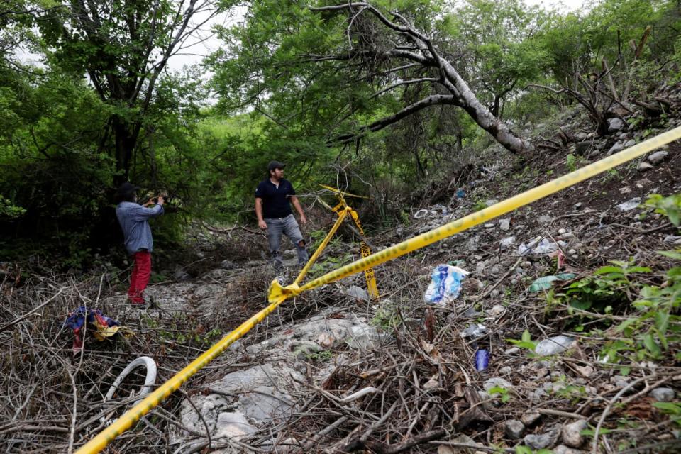 <div class="inline-image__caption"><p>Some of the remains of Christian Alfonso Rodriguez Telumbre, one of the 43 missing students, was found at the mountain town of Cocula, near Iguala</p></div> <div class="inline-image__credit">REUTERS/HENRY ROMERO</div>